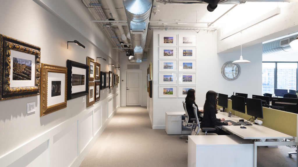 A person sitting at a desk in an office.